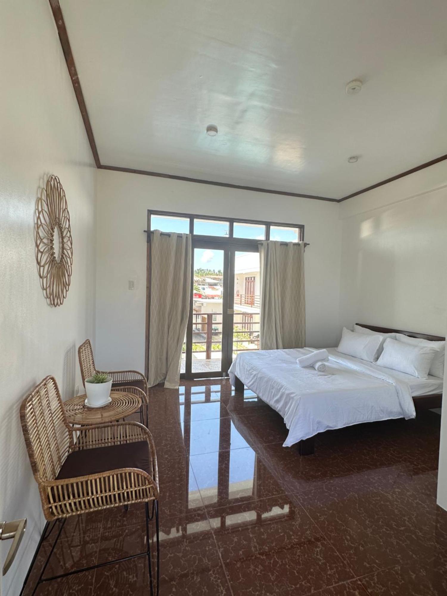 Haven Suites Siargao Хенераль-Луна Номер фото
