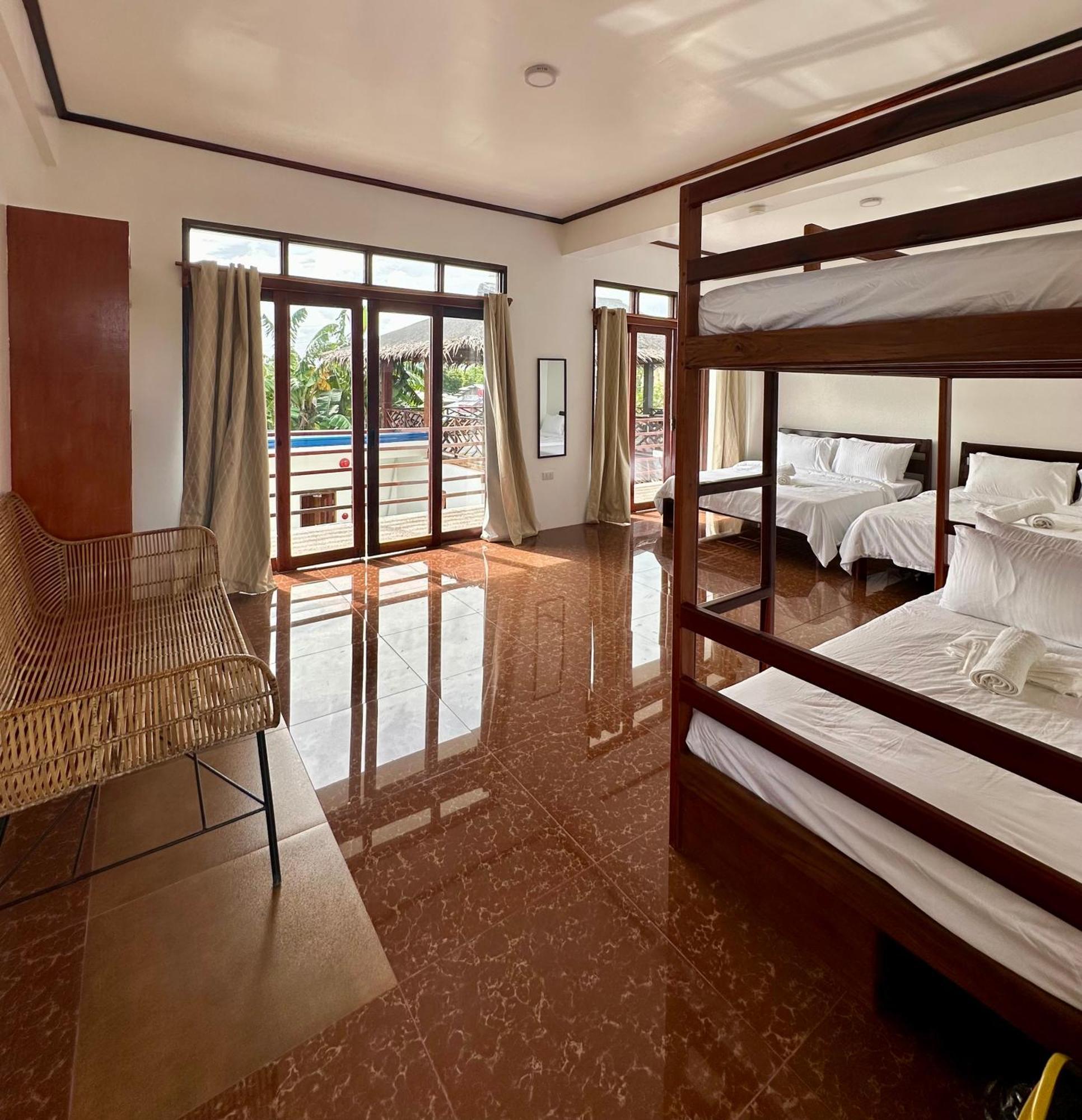 Haven Suites Siargao Хенераль-Луна Номер фото